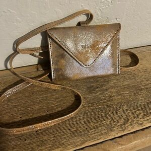 Velez leather wallet or coin purse with a metallic "folia" finish.